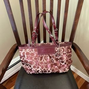 Coach purse, leather straps with monogram signature canvas in burgundy